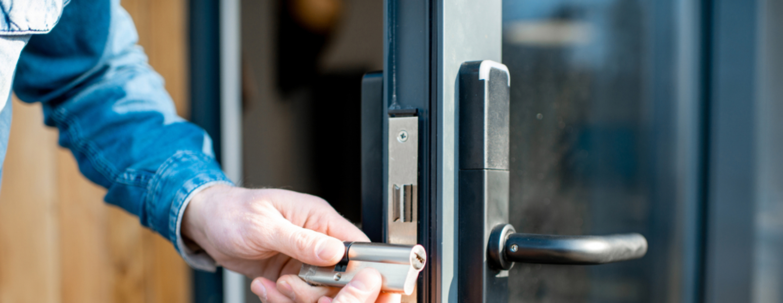 locksmith unlocking a lock