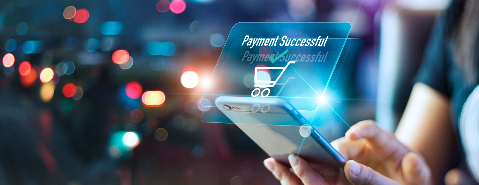 Person with phone with on screen text saying payment successful