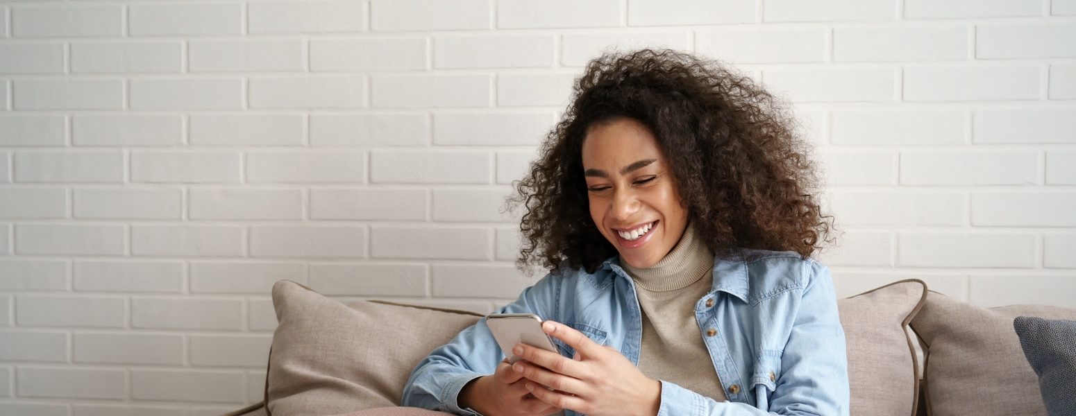 A woman looking at her phone