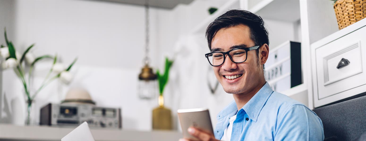 A businessman looking at his phone