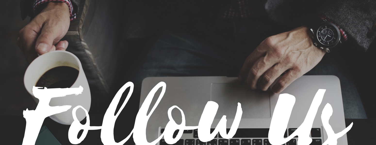 Man at laptop with the words 'follow us' superimposed over the image