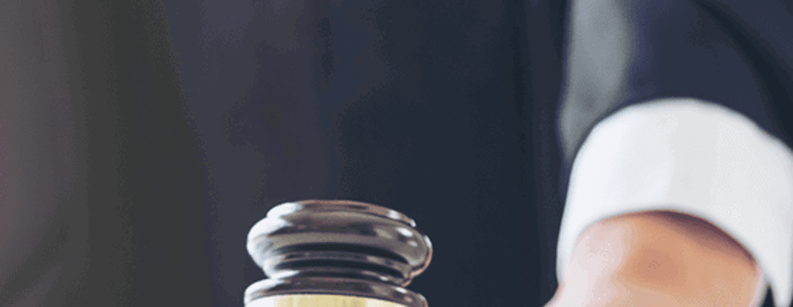 A judge with a gavel.