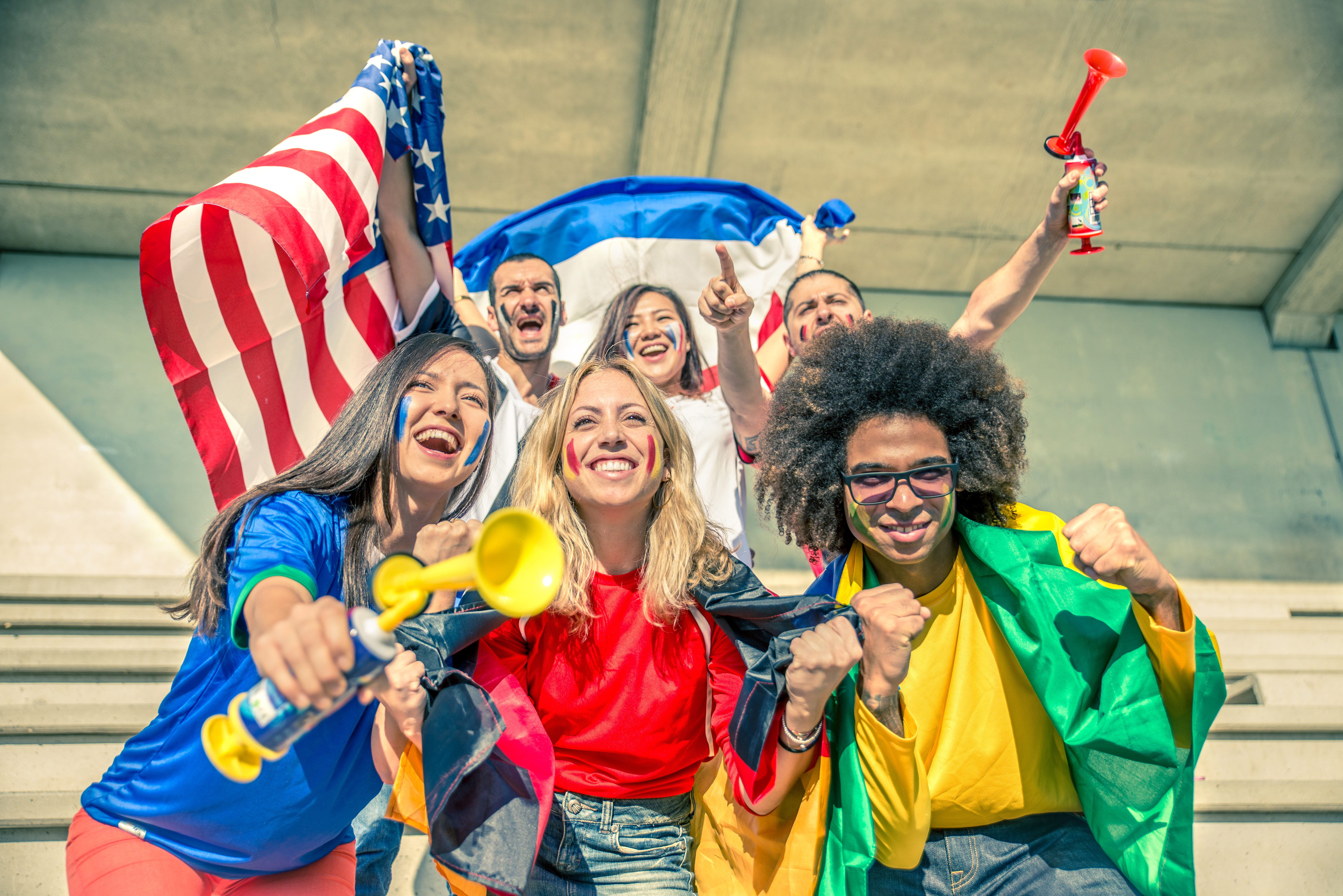 A group of people celebrating the games