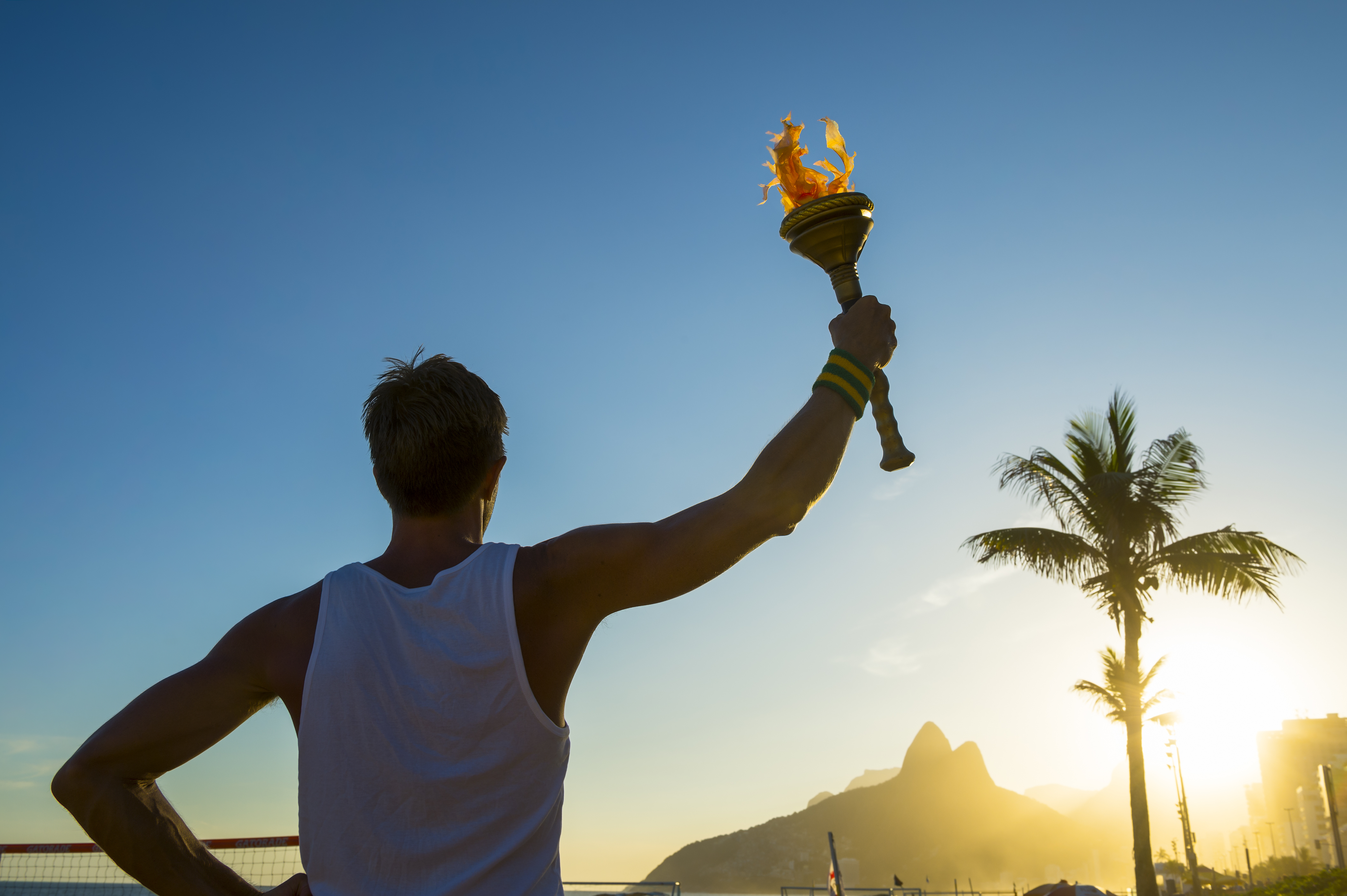 A man holding the Olympic torch