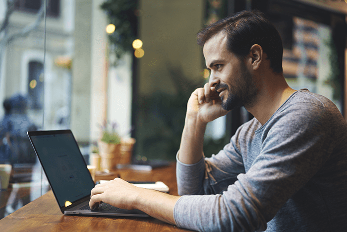 A man on his laptop.