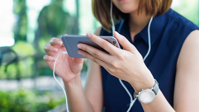 Woman looking at her phone.