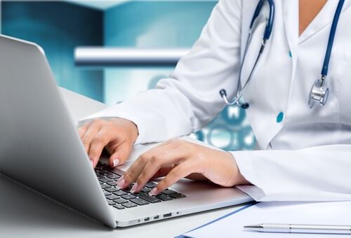 An image of doctor on a computer or tablet